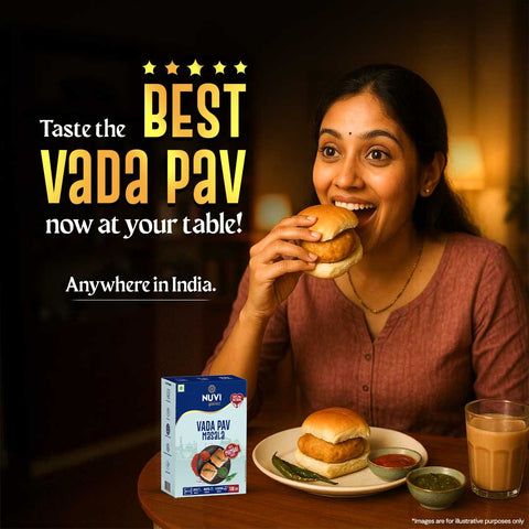 Woman enjoying the BEST VADA PAV at home with tasty chutneys and packaging on the table.